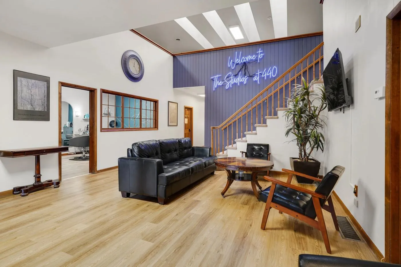 Lobby at The Studios at 440 with the neon welcome sign